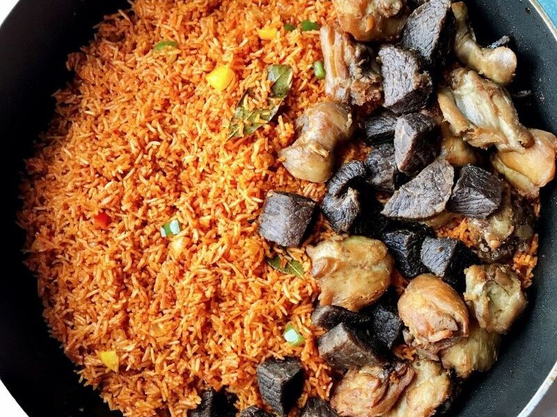 Insanely delicious party-style Nigerian basmati Jollof rice is the only Jollof rice recipe you need. The fusion of basmati rice with tomatoes, peppers, onions, garlic, curry, thyme, bay leaves, and other herbs/spices makes this party Jollof absolutely flavorful and tasty! The best part about making basmati Jollof rice is that it takes no time to cook. Amazingly, you can further cut down on this cooking time by making the sauce or base ahead of time. Call family and friends, let’s gather for this authentic crowd-pleasing party-style Jollof rice recipe! #Jollofrice #Africanfood #Nigerianfood #PartyJollofrice #NigerianJollofrice #BasmatiJollofrice #Jollof
