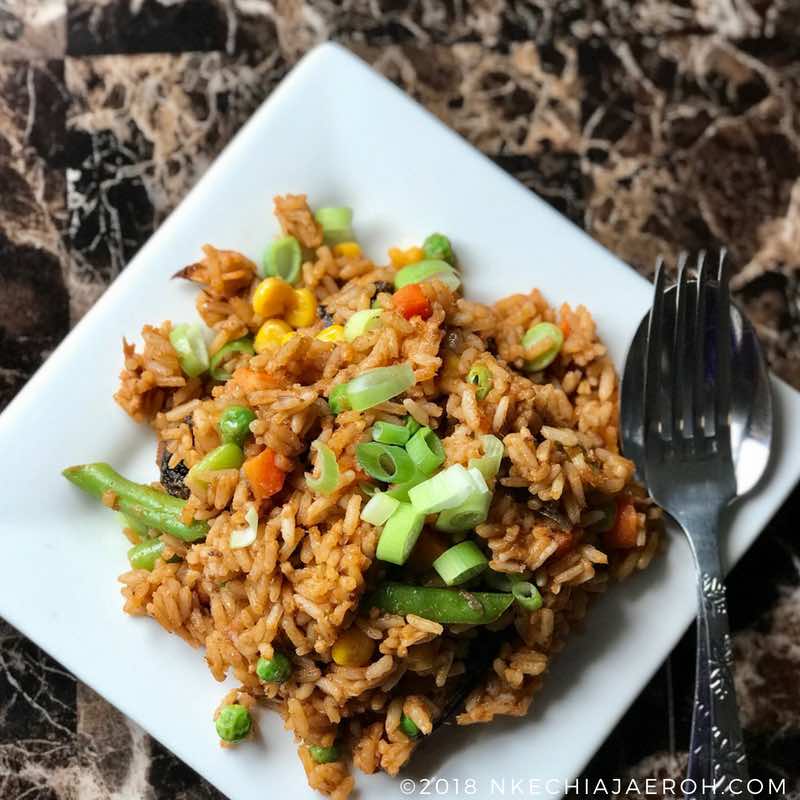 The Ultimate Nigerian Fancy Smoky Jollof Rice Recipe | Nkechi Ajaeroh