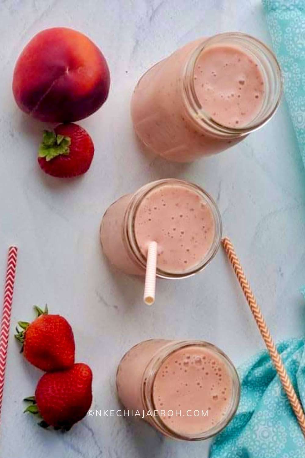 Healthy peach and strawberry smoothie is super easy to make, tasty, and refreshing! This nourishing breakfast smoothie is made with only five ingredients - frozen peaches, frozen strawberry, frozen, yogurt and orange juice! Though this is a vegetarian smoothie recipe, you can easily make it vegan by substituting Greek yogurt with a dairy-free yogurt. #Smoothies #breakfastsmoothie #healthysmoothie #peachsmoothie #strawberrysmoothie