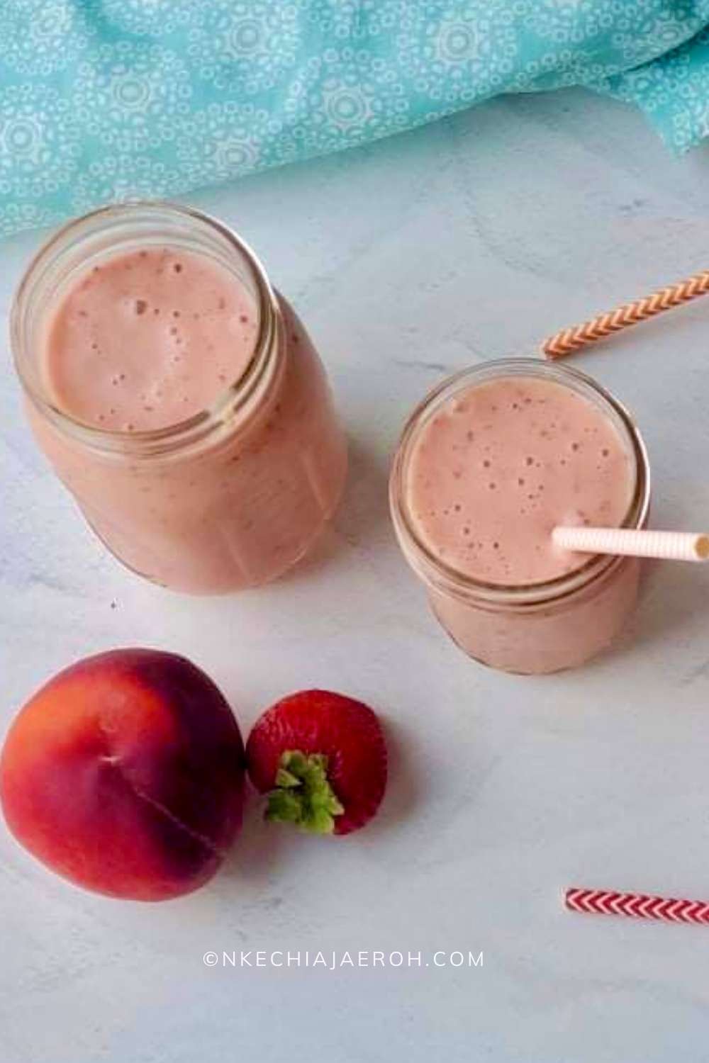 Healthy peach and strawberry smoothie recipe is super easy to make, tasty, and refreshing! This nourishing breakfast smoothie is made with only five ingredients - frozen peaches, frozen strawberry, frozen, yogurt and orange juice! Though this is a vegetarian smoothie recipe, you can easily make it vegan by substituting Greek yogurt with a dairy-free yogurt. #Smoothies #breakfastsmoothie #healthysmoothie #peachsmoothie #strawberrysmoothie