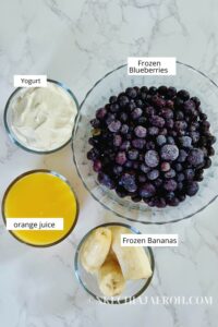 Frozen blueberries, frozen bananas, yogurt and orange juice