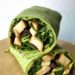 Super easy to make healthy taco wrap recipe using a "Garden Spinach Herb Wrap," aka, the taco shell. Then filled up with well-seasoned and sautéed chicken breast, fresh spinach leaves, and spicy guacamole. Dry cranberries and green onions are optional, however necessary. This is the easiest healthy taco wrap recipe you will have to make, perfect for a quick lunch or busy weeknights. Taco recipe is adaptable, versatile, and easily customizable. Hope you enjoy!