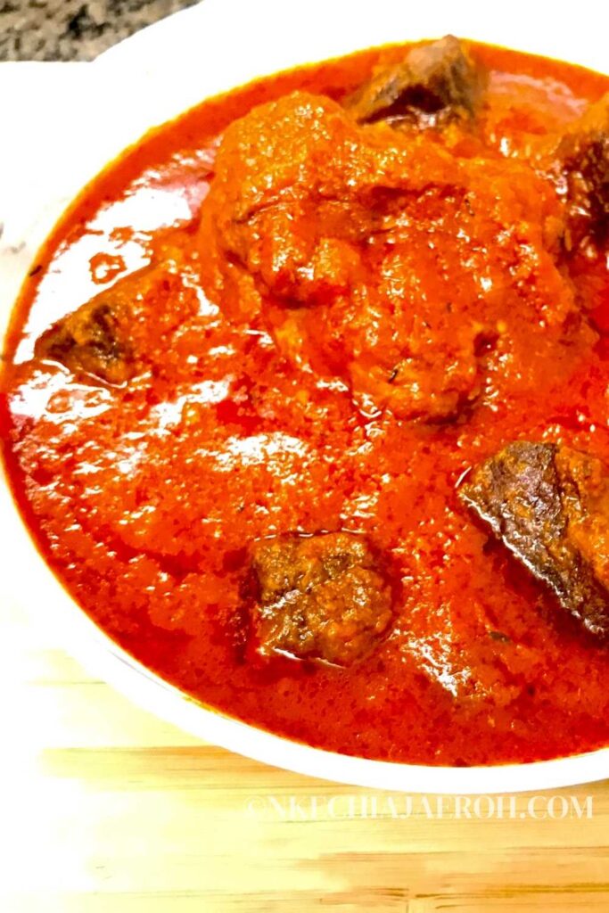 Easy and tasty Nigerian Tomato Stew made with fresh tomatoes, onion, bell peppers, meat, chicken, herbs, and seasonings. This is hands down the most delicious sauce from West Africa.