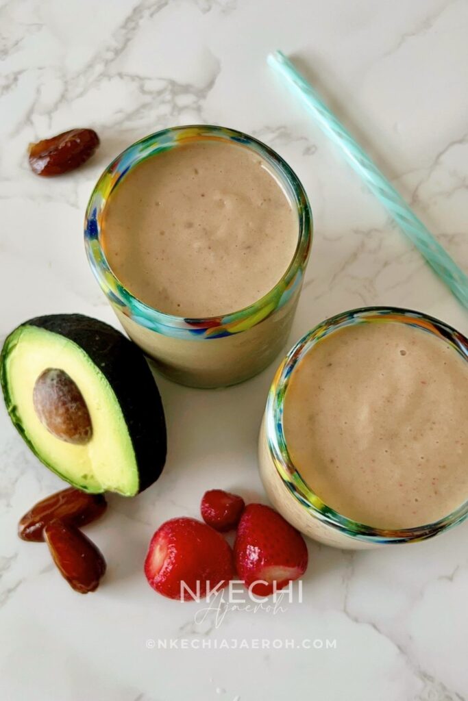 Creamy, nutritious, and delicious avocado strawberry date smoothie recipe combines fresh avocado, frozen strawberries, fresh pitted dates, almond milk, banana, and maple syrup. These vegan, gluten-free, natural ingredients make an excellent, nourishing smoothie! The creaminess of avocado and banana, combined with the sweetness of medjol dates and maple syrup, takes this smoothie to the next level. You won't taste the avocado at all. Do not be deceived by the color of this smoothie; it's refreshingly delicious! The best part is that this avocado strawberry smoothie is super easy-peasy to make! Add your ingredients to the blender, and it's ready in a few minutes.