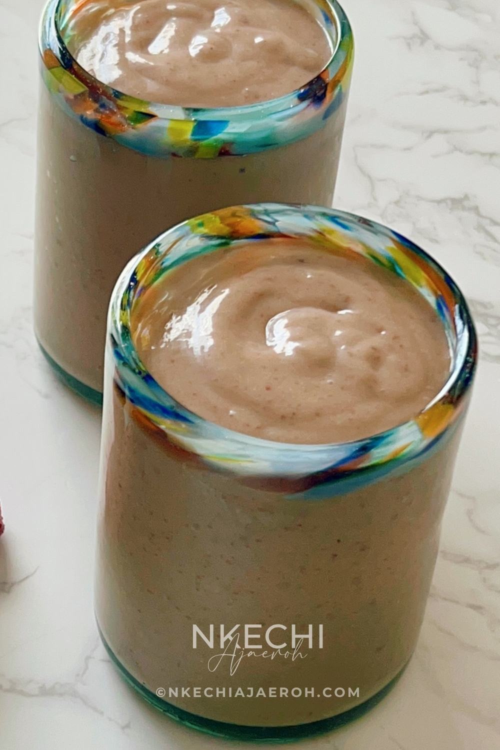 Creamy, nutritious, and delicious avocado strawberry date smoothie recipe combines fresh avocado, frozen strawberries, fresh pitted dates, almond milk, banana, and maple syrup. These vegan, gluten-free, natural ingredients make an excellent, nourishing smoothie! The creaminess of avocado and banana, combined with the sweetness of medjol dates and maple syrup, takes this smoothie to the next level. You won't taste the avocado at all.