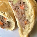 Learn how to make Nigerian Meat pie with my easy step by step instructions. Nigerian Meat pie, also known as African meat pie is a savory pastry filled with minced meat and vegetables. And then baked to perfection. Nigerian Meat is a perfect street snack in Nigeria and for Nigerians abroad. #Nigerianfood #Meatpie #Nigerianmeatpie #Africanfoodrecipe