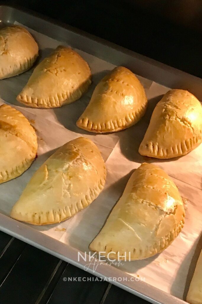 This classic Nigerian meat pie recipe features a flaky, buttery crust filled with a deliciously seasoned meat and vegetable filling. A beloved Nigerian snack and party food, these homemade meat pies are perfect for holidays, gatherings, meal prep, or anytime you want a taste of home.