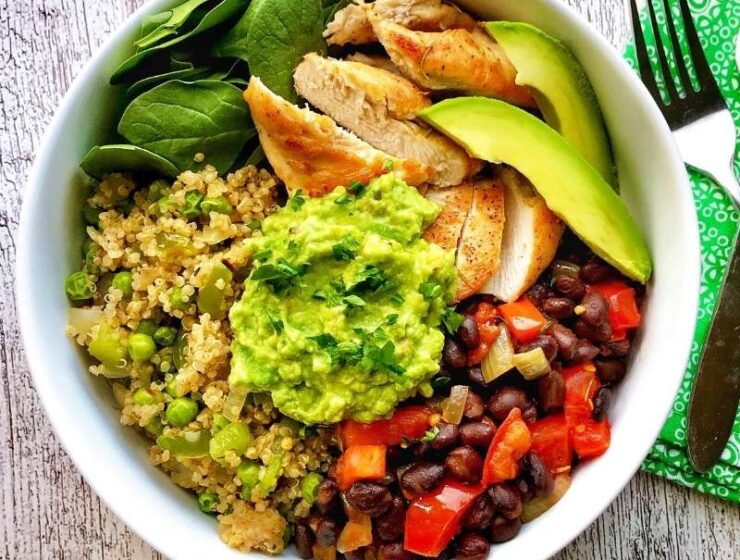 Nutrient-dense + tasty quinoa bowl recipe with black beans is literally the best thing E V E R! Listen, this is about to be your favorite quinoa bowl from now on (I AM NOT KIDDING)! Already cooked quinoa is deliciously sauteed with onions, bell peppers, mixed veggies, and spices. Sauteed black beans, chicken breast, mashed avocado, and fresh baby spinach completes this healthy quinoa bowl recipe! Finally, top this bowl with chopped fresh parsley and avocado slices and enjoy! #quinoarecipe #quinoabowl #blackbeanrecipe #quinoablackbeans #tacobowl