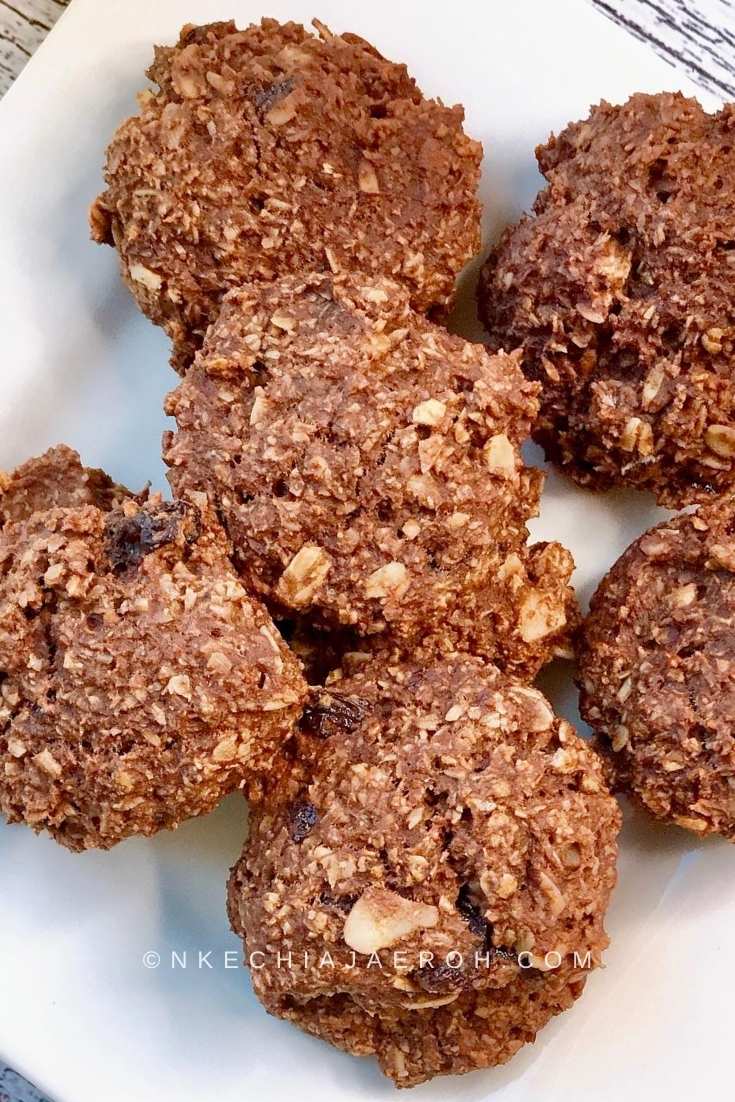 This Healthy Vegan Almond Oats Cacao Cookie is the perfect breakfast cookie, and they are no joke! They are Low carb, Refined Sugar-free, Gluten-free, Paleo-friendly. My kids love, and we the adults adore them! What's not to love, these wholesome cookies are guilt-free and delicious! They make a great snack, and they require few ingredients. #Vegancookies #breakfastcookies #bananaoatmeal #breakfastrecipe #vegan #healthycookies #oats