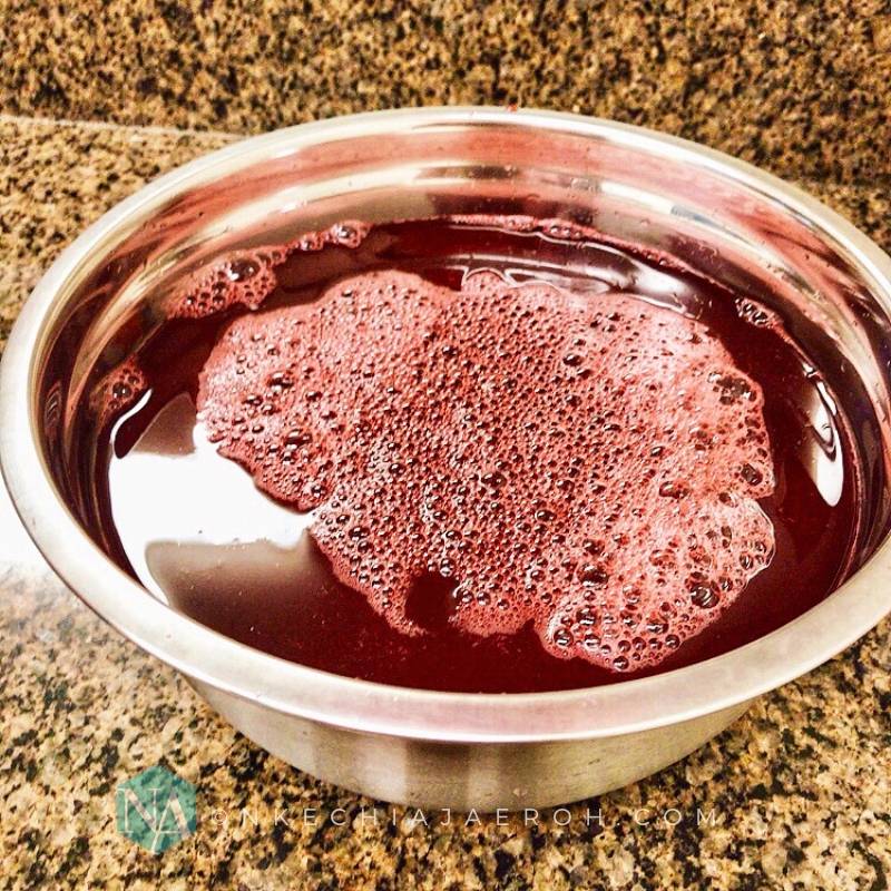 Zobo drink cooling off in a big bowl