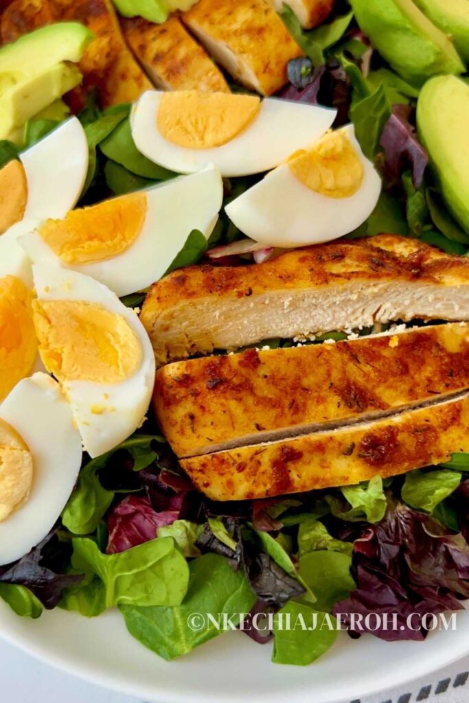 This 4-ingredient spring mix salad with air fryer chicken breast and apple cider vinaigrette is fresh, flavorful, and easy to make. You need spring mix salad greens, air fryer chicken breast, air fryer boiled eggs, and avocado. This spring mix salad recipe is a healthy keto/low-carb salad recipe you need in your arsenal. It is also gluten-free, dairy-free,  and perfect for meal prep. You can prep all the ingredients individually at the start of the week and then assemble them for an easy weekday lunch or dinner. 