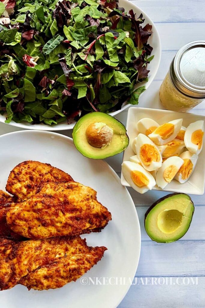 This 4-ingredient spring mix salad with air fryer chicken breast and apple cider vinaigrette is fresh, flavorful, and easy to make. You need spring mix salad greens, air fryer chicken breast, air fryer boiled eggs, and avocado. This spring mix salad recipe is a healthy keto/low-carb salad recipe you need in your arsenal. It is also gluten-free, dairy-free,  and perfect for meal prep. You can prep all the ingredients individually at the start of the week and then assemble them for an easy weekday lunch or dinner. 