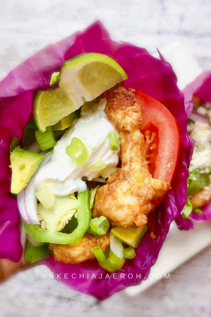 Tasty Nigerian Suya Skewers with Red cabbage, some sour cream, jalapeno, and avocado