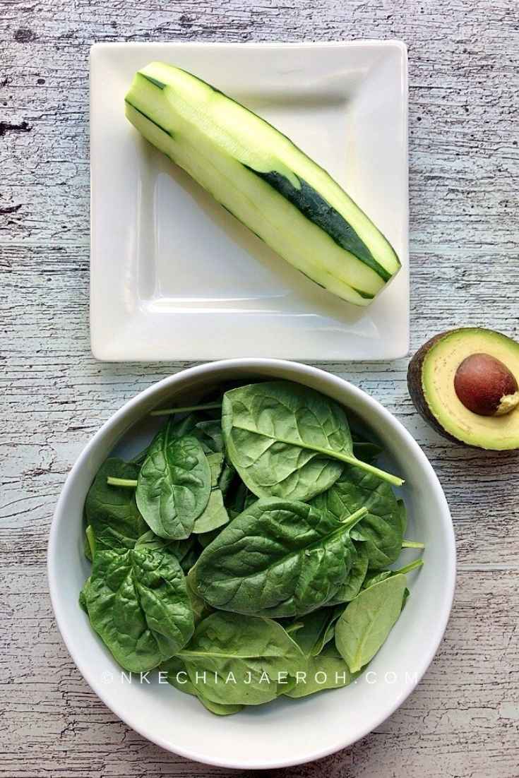 Raw spinach, cucumber, and avocado for The best Taco salad bowl recipe