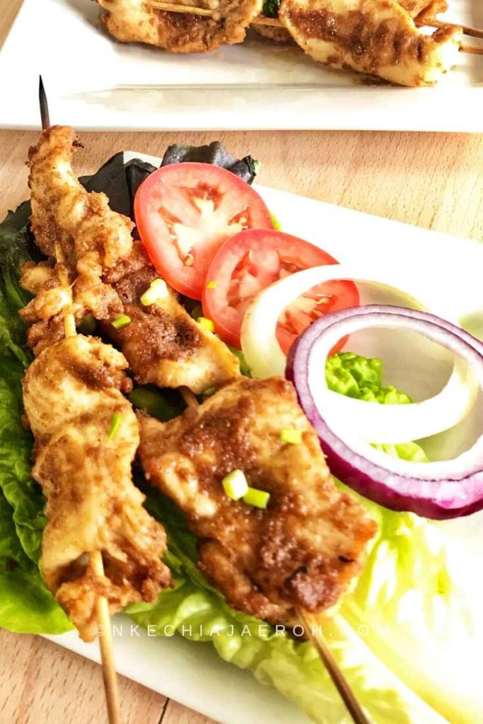 easy and delicious Nigerian Chicken Suya served with lettuce leaves
