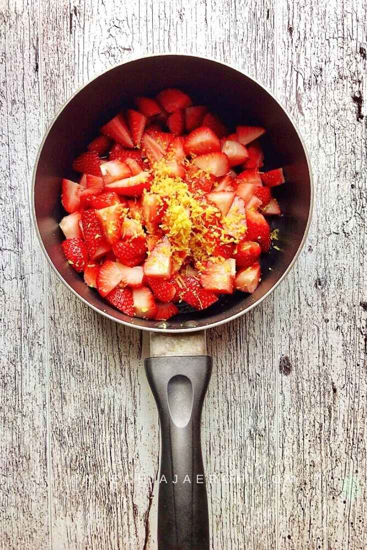 Fresh Strawberries quartered, and sprinkled with lemon zest for sugar-free homemade strawberry sauce recipe.