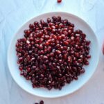 Learn the easy way to cut and seed a pomegranate fruit in less than two minutes. With this method, I will show you how to de-seed a pomegranate without water. Trust and believe that this step by step guide is the best way to seed a pomegranate, and it never fails.