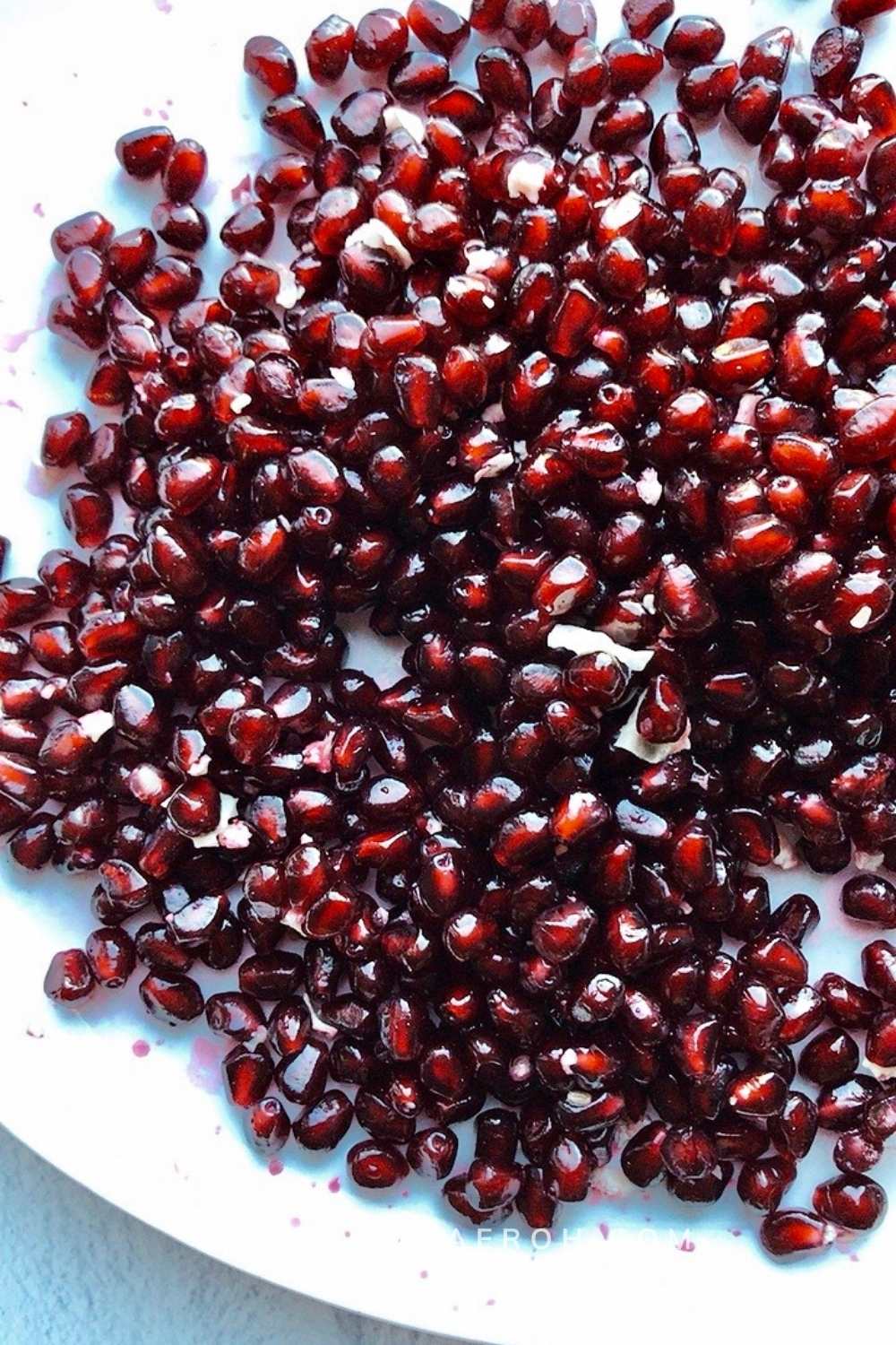 Pomegranate seeds can stain, so be careful not to allow them to burst everywhere. 