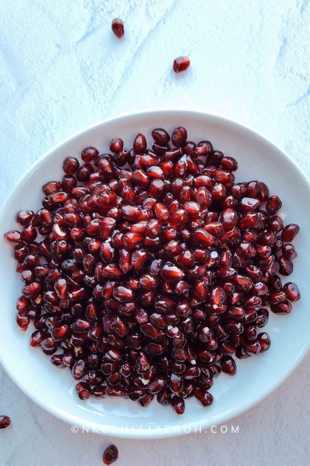 Learn how to cut and seed a pomegranate without water - this easy to follow steps will get you eating pomegranates!