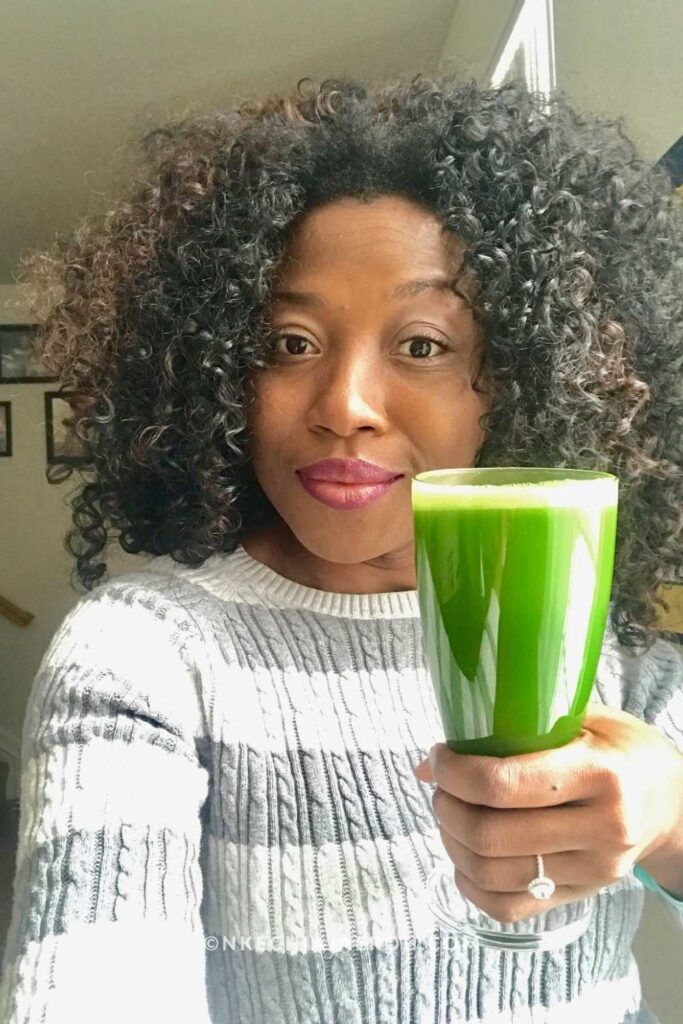 Nkechi Ajaeroh enjoying a cup of green juice.