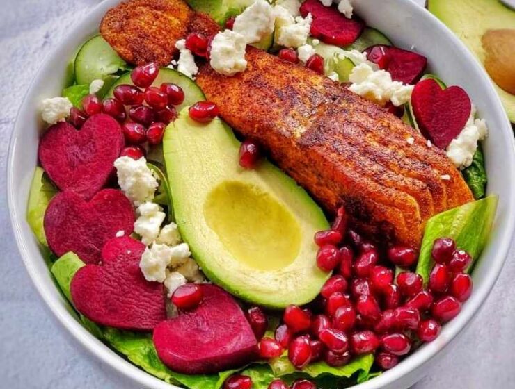 Easy to make raw beetroot and feta cheese salad with lettuce, cucumber, avocado, and salmon; serve with creamy yogurt dressing and top with your favorite things! I added pomegranate seeds, and it was perfect; the best part is that this recipe takes less than 15 minutes to put together. This heart-healthy beet salad is a dream!#Beet #beetroot #beetsalad #beetrootsalad #hearthealthysalad #beetsaladandfetacheese #beetrootandfetacheese #healthysaladrecipe
