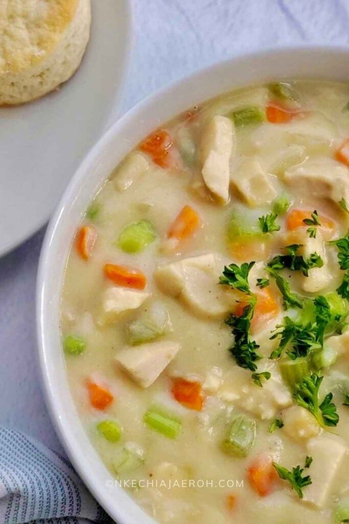 A hearty pot pie soup bowl served warm with biscuits is always the best! This soup is gluten-free, dairy-free, nut-free, grain-free, low-carb, and whole30-friendly! This easy-to-make heart-healthy pot pie soup will keep you satisfied.