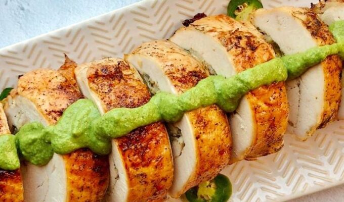 Take the stress out of your holiday cooking with this easy oven-baked stuffed turkey breast recipe. Oven roasted boneless stuffed turkey breast is moist, juicy, tender, and incredibly delicious! This simple baked turkey breast is the perfect alternative to a full-size turkey for small families during the holidays. (And beyond)! Also, making turkey breast takes way less time than a whole turkey. Yet very flavorful and perfect for a small gathering! With its crispy skin tender inside, your whole family is going to love this well-seasoned turkey meat! #turkeybreast #ovenroastedturkey #thanksgivingturkey #bonelessturkeybreast #holidays