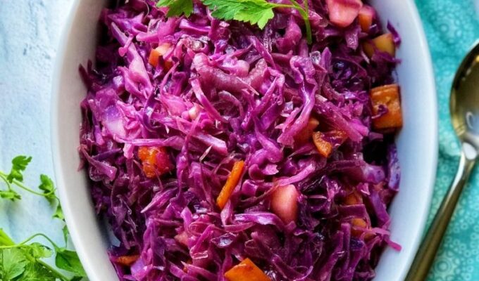 Super easy healthy braised red cabbage with apples and red onions is the best side dish ever! It's savory, sweet, a little sour, tangy, and wonderfully complements every main dish. This recipe is vegan, gluten-free, refined sugar-free, keto – friendly and packed with flavorful herbs and spices. Look no further for a fabulous + tasty, healthy side you need for the holidays especially Thanksgiving and Christmas. Also, it comes together so quickly! #Cabbage #Braisedcabbage #healthysidedish #sidedish