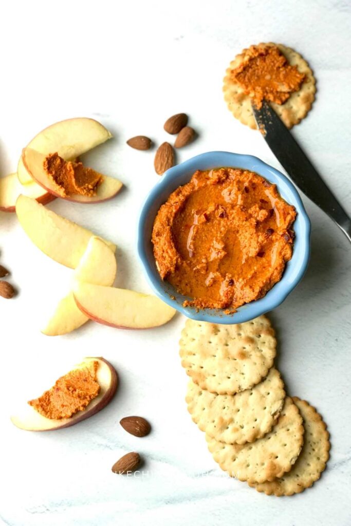Romesco sauce (romesco dip) is a rich Spanish sauce that can literally wake up any dish. It is sharp, bold, zesty, and full of flavors from roasted red peppers, charred or sundried tomatoes, nuts, herbs, and seasonings! Traditional romesco sauce recipe includes oil. Flour or ground stale bread thickened Spanish romesco sauces; they are the perfect sauce or dip for fish, meat, vegetables, and crackers. #Sauce #Romescosauce #Spanishromesco #romescorecipe #romesco #homemaderomescosauce #romescodip
