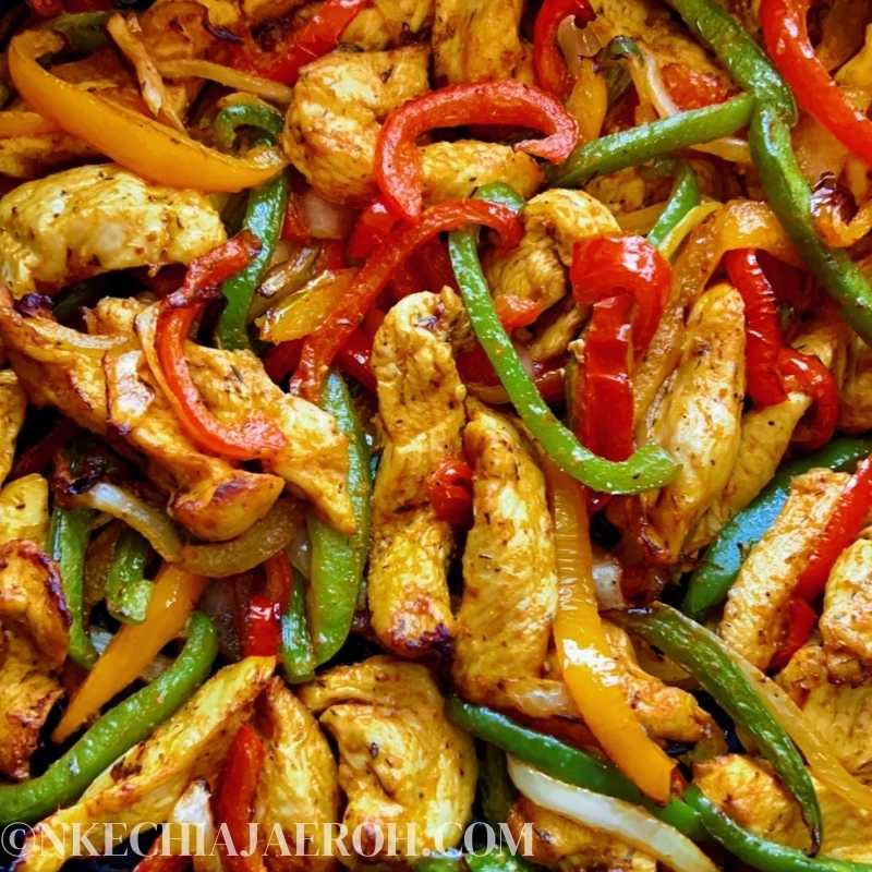 Chicken fajitas in an air fryer may be the best possible way to cook this tex-mex meat and vegetable dish. It is juicy, tender, tasty, and cooks in no time. The part is that clean-up is easy peasy! This fun, flavorful and colorful healthy air fryer chicken breast fajitas make a perfect lunch or dinner any time! Serve these on tortillas, rice bowls, or just eat as is! YUM! Garnish healthy chicken fajitas with guacamole, sour cream, salsa, pico de gallo, cheese, tomatoes, or chopped cilantro. #fajitas #airfryerfajitas #airfryerrecipes #healthyfajitas