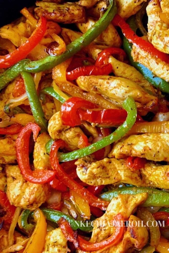 Chicken fajitas in an air fryer may be the best possible way to cook this tex-mex meat and vegetable dish. It is juicy, tender, tasty, and cooks in no time. The part is that clean-up is easy peasy! This fun, flavorful and colorful healthy air fryer chicken breast fajitas make a perfect lunch or dinner any time! Serve these on tortillas, rice bowls, or just eat as is! YUM! Garnish healthy chicken fajitas with guacamole, sour cream, salsa, pico de gallo, cheese, tomatoes, or chopped cilantro. #fajitas #airfryerfajitas #airfryerrecipes #healthyfajitas