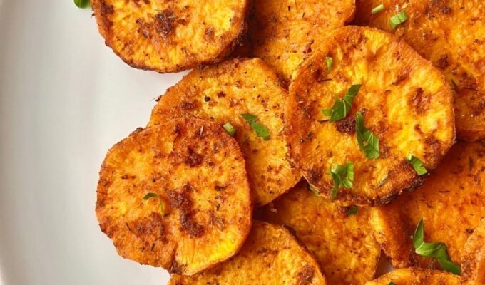 Buttery air fryer sweet potato slices (sweet potato rounds) are easy and the best potato side dish for any main! Crispy, buttery, and tender sweet potato slices in air fryer are easy to make, come through very quickly, and are absolutely satisfyingly addictive! If you are a sweet potato lover, then you are in for a treat because these sliced air fried sweet potatoes are heaven. They are fantastic for any main dish, snack, or simply add some to salad bowls, lunches, or casserole and enjoy! #sweetpotatoslices #sweetpotatorounds #sweetpotatorecipe #sidedish #healthysidedish