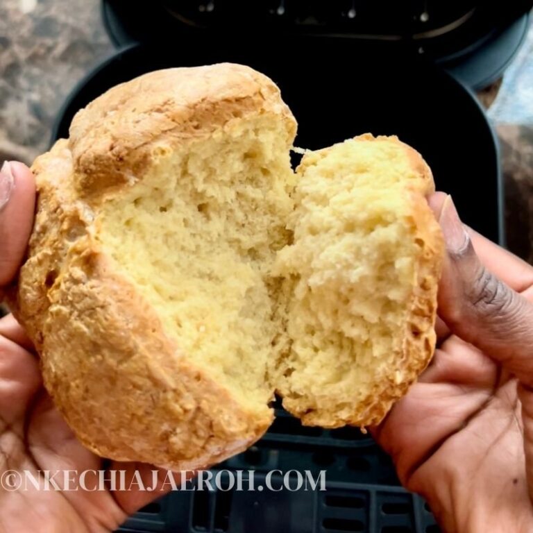 A simple recipe of homemade Irish soda bread made with white flour, baking soda, buttermilk, salt, and sugar and baked in the air fryer. This soda bread recipe is delicious and hearty; crusty/rustic outside and dense inside. It is not too dense and yet not too fluffy either; however, it is thicker than your regular sandwich made with yeast. The name "soda bread" means baking soda, aka "bicarbonate soda," is used to leaven this bread instead of yeast. Making St. Patricks' Day homemade Irish Soda Bread in Air Fryer is easy. Soda bread or bread soda is a quick bread recipe made with baking soda. It requires no kneading and only a few ingredients. #Sodabread #Irishsodabread #Breadsoda #AirfryerIrishsodabread #Airfryerbread #Stpatrickday #Irishdayrecipe