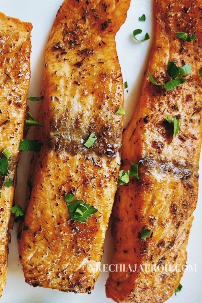 Air fryer salmon is easy, quick, tasty, and cooks in less than 10 minutes. This best healthy salmon recipe has a crisp outside and flaky + tender inside! Air-fried salmon is flavorful, tasty, light, and perfect with any side dish! This is genuinely the best healthy salmon recipe; also, it is low-carb, keto, gluten-free, dairy-free, soy-free, and nut-free! #Salmon #seafood #Airfryersalmon #Fishrecipe #salmonrecipe #healthysalmonrecipe 