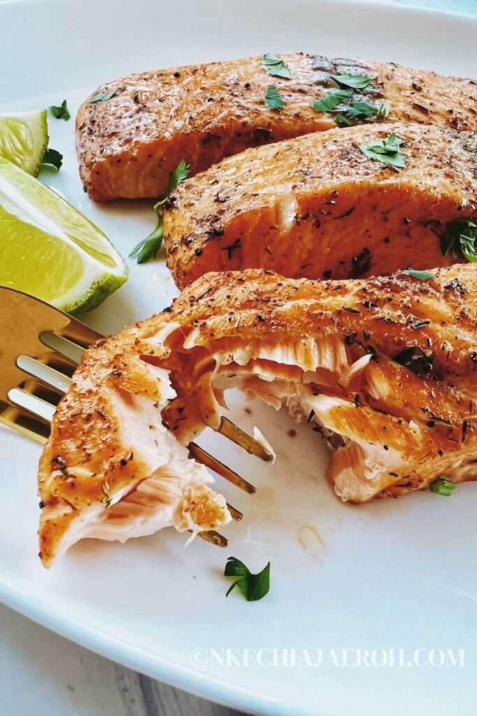 Air fryer salmon is easy, quick, tasty, and cooks in less than 10 minutes. This best healthy salmon recipe has a crisp outside and flaky + tender inside! Air-fried salmon is flavorful, tasty, light, and perfect with any side dish! This is genuinely the best healthy salmon recipe; also, it is low-carb, keto, gluten-free, dairy-free, soy-free, and nut-free! #Salmon #seafood #Airfryersalmon #Fishrecipe #salmonrecipe #healthysalmonrecipe
