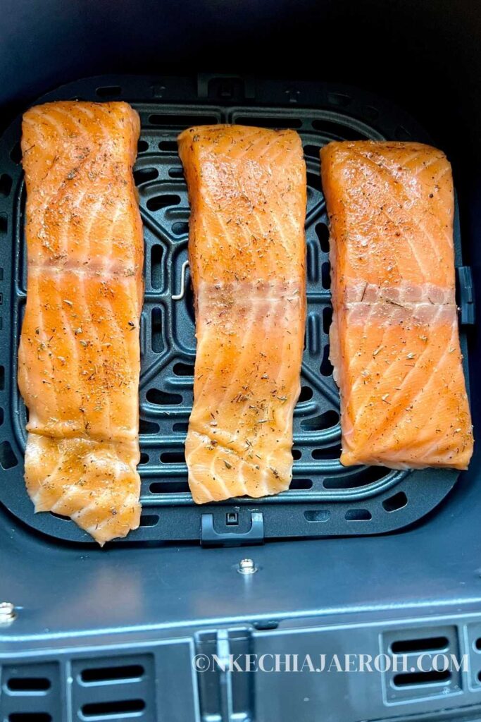 Place the salmon fillets in the air fryer basket