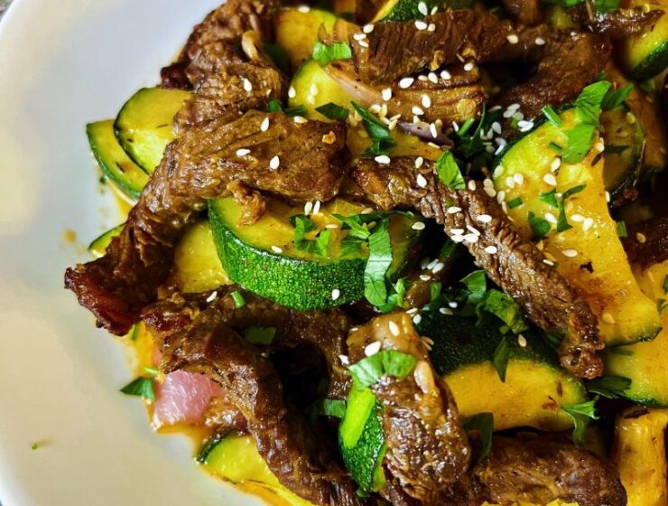 An easy air fryer ribeye steak and zucchini (stir-fry) is a healthy low-carb meal you can easily make in the air fryer. When you air fry a ribeye steak, you end up with a juicy, tasty + satisfying piece of meat. Steak and zucchini stir-fry in the air fryer guarantees you a healthy quick, and easy lunch or dinner. Air-fried ribeye steak and zucchini meal is gluten-free, dairy-free, whole30, low-carb, and keto. #stea #airfryersteak #lowcarb #zucchini #stirfry