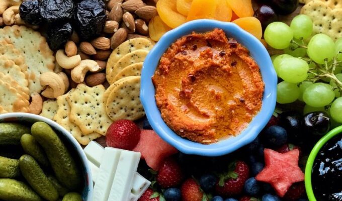 Easy to make healthy charcuterie board is vegetarian (no meat) and more nutritious than most cheese boards. Packed with summer fruits, brined veggies, dried fruits, and nuts, this is the only vegetarian charcuterie board recipe you will ever need! The best thing about a charcuterie board is that it is very customizable, so a charcuterie at BBQs, picnics, parties, and gatherings is a great idea! If you are looking for a 4th of July charcuterie board or summer charcuterie board idea, I got you! This board has the perfect red, white and blue patriotic colors to celebrate American Independence. #charcuterie #healthycharcuterie #Vegetariancharcuterie
