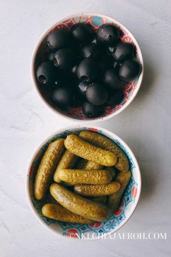 Pickled cucumbers and olive for a healthy charcuterie board 