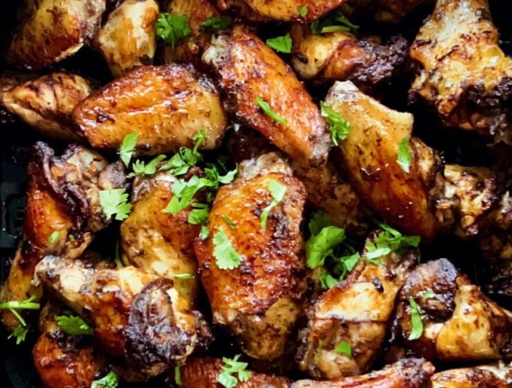 Easy air fryer jerk chicken wings are smoky, spicy, flavorful, and tasty! Crispy on the outside and yet tender and juicy inside. You will be licking every drop of seasoning off your fingers and will never get tired of eating these jerk-seasoned chicken wings. If you are looking for the perfect party dish, these air-fried Jamaican jerk chicken wings are it! #airfryerjerkchicken #jerkchicken #airfriedjerkchicken #chickenwings #jerkmarinade