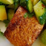 Cajun Air Fryer Salmon with Avocado Salsa takes less than 20 minutes and is healthy and super-delicious! To make this easy salmon salad recipe, you will need salmon and an air fryer. Make the avocado salsa with ripe avocado, baby English cucumber, olive oil, freshly squeezed lemon juice, cilantro, salt, and pepper. Hands down, the best air fryer salmon recipe with avocado salad for just one person!