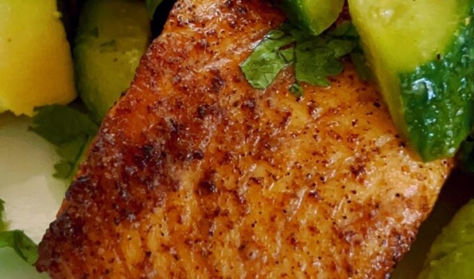 Cajun Air Fryer Salmon with Avocado Salsa takes less than 20 minutes and is healthy and super-delicious! To make this easy salmon salad recipe, you will need salmon and an air fryer. Make the avocado salsa with ripe avocado, baby English cucumber, olive oil, freshly squeezed lemon juice, cilantro, salt, and pepper. Hands down, the best air fryer salmon recipe with avocado salad for just one person!