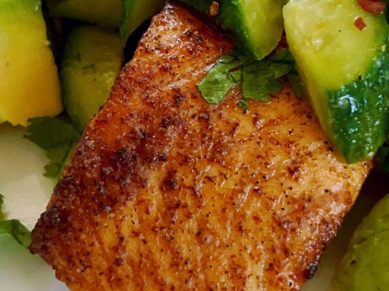 Cajun Air Fryer Salmon with Avocado Salsa takes less than 20 minutes and is healthy and super-delicious! To make this easy salmon salad recipe, you will need salmon and an air fryer. Make the avocado salsa with ripe avocado, baby English cucumber, olive oil, freshly squeezed lemon juice, cilantro, salt, and pepper. Hands down, the best air fryer salmon recipe with avocado salad for just one person!