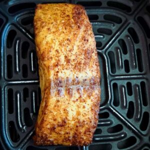 Cajun Air Fryer Salmon with Avocado Salsa takes less than 20 minutes and is healthy and super-delicious! To make this easy salmon salad recipe, you will need salmon and an air fryer. Make the avocado salsa with ripe avocado, baby English cucumber, olive oil, freshly squeezed lemon juice, cilantro, salt, and pepper. Hands down, the best air fryer salmon recipe with avocado salad for just one person!