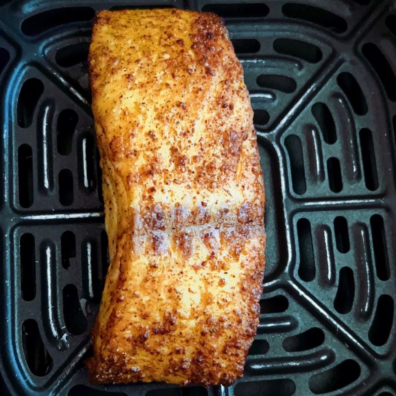Cajun Air Fryer Salmon with Avocado Salsa takes less than 20 minutes and is healthy and super-delicious! To make this easy salmon salad recipe, you will need salmon and an air fryer. Make the avocado salsa with ripe avocado, baby English cucumber, olive oil, freshly squeezed lemon juice, cilantro, salt, and pepper. Hands down, the best air fryer salmon recipe with avocado salad for just one person!