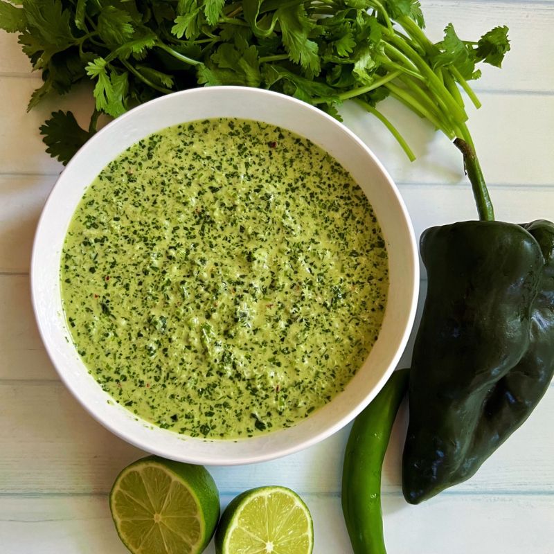 Homemade cilantro lime marinade is pungent, tangy, and packed with flavors. Combine fresh cilantro leaves, limes, garlic, poblano pepper, Serrano peppers, green onions/spring onions, olive oil, salt, and pepper to make the best cilantro lime marinade. This easy cilantro marinade is Versatile; great as a marinade, sauce, dip, or dressing. Cilantro lime marinade/sauce is vegan, gluten-free, sugar-free, and health-improving! #marinades #sauces #dips #cilantro #lime