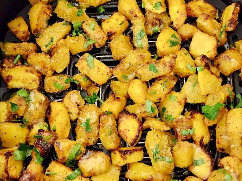 Acorn squash is a winter squash variety that is loaded with nutrition. It's low in calories but full of fiber and deliciously hearty. This buttery roasted air fryer acorn squash recipe is flavorful, easy, and perfect for your holiday dinners. Need a quick and delicious side dish everyone will want to pile onto their plates? Air fryer roasted acorn squash is the answer you need! You can also bake fresh acorn squash in the oven if you do not have an air fryer! Baked acorn squash is the best fall side dish for the holidays!