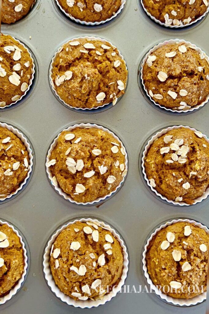 These easy-to-make whole wheat pumpkin muffins with oats are fluffy, moist, pliable, and packed with healthy nutrients! Whole wheat pumpkin muffins require only simple ingredients such as whole wheat flour, oats, pumpkin purée, almond milk, warm fall spices, etc.! These pumpkin muffins are healthier than most pumpkin muffin recipes; these are lower in sugar and contain healthy fiber! Perfect fall/autumn season treat your entire family will enjoy. #Pumpkins #Pumpkinmuffins #Fall #Autumn #Pumpkinseason #breakfastmuffin 