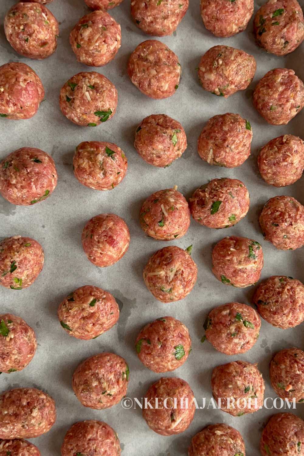 Place formed meatballs on a lined cookie sheet; I suggest forming all the meatballs before you start air frying them because the air frying part happens quickly.
