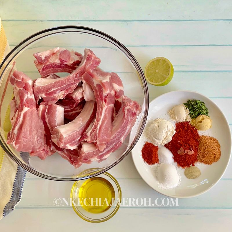 Raw baby back ribs, olive oil, herbs and spices 